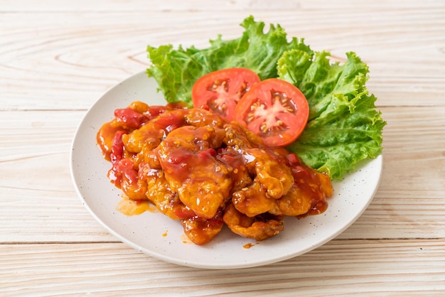 Fried fish topped with 3 flavors chili sauce