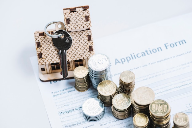 From above coins and key on mortgage application