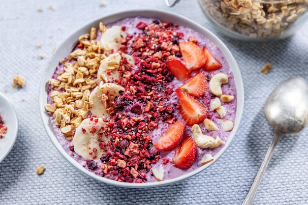 Fruity healthy muesli bowl on table