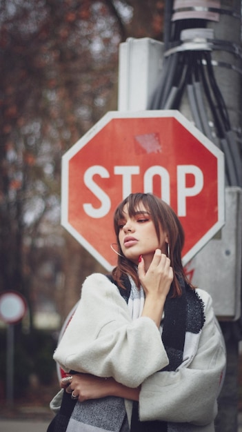 Photo full length of a young woman with text