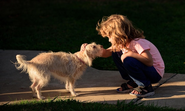 Funny kid with puppy dog