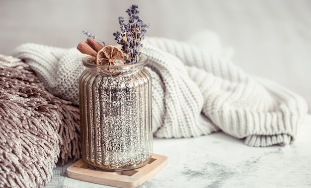 Glass jar with dry lavender flowers and spices