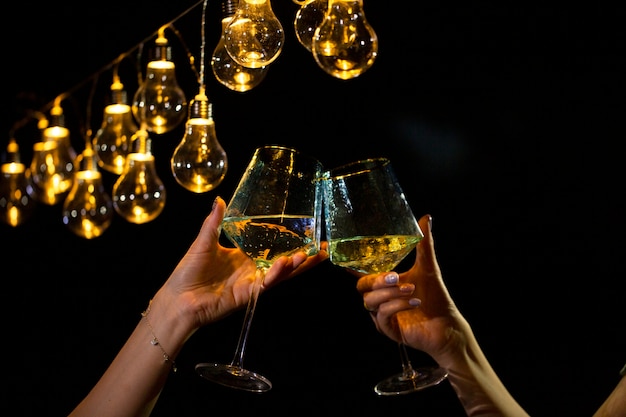 Glasses with wine on the summer terrace.