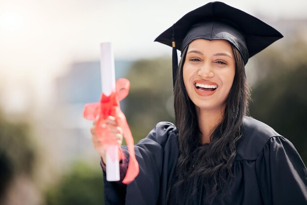 Photo graduate portrait and excited woman celebrate with diploma for achievement and success at college campus face smile and graduation with certificate scroll outdoor at university for education goal