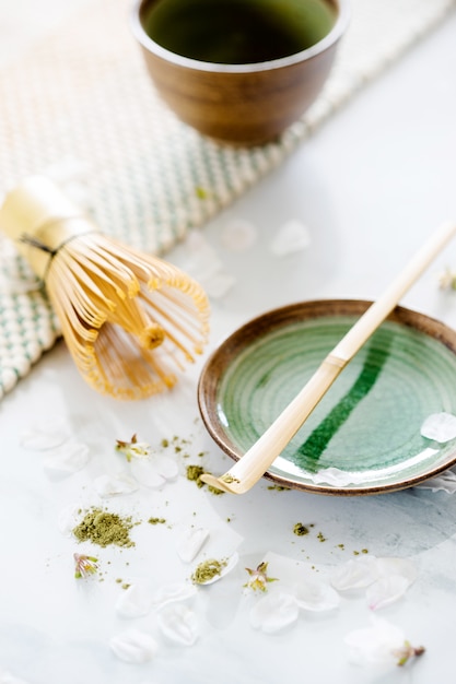 Green tea matcha in a bowl on table