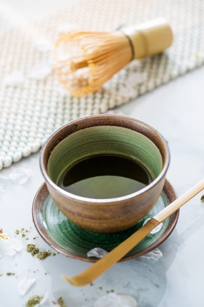 Green tea matcha in a bowl on table