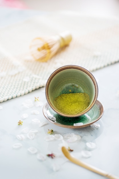 Green tea matcha in a bowl on table