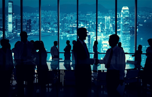 Group of business people discussing in a conference room.