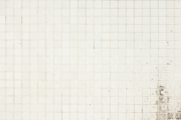 Grunge white tiles texture background.