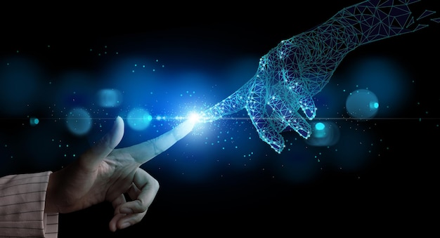 Hand of businesswoman touching hand artificial intelligence meaning technology connection future