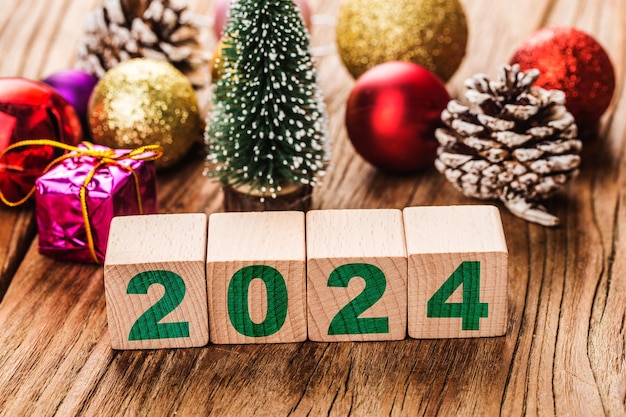 Photo happy new year 2024 christmas 2024 christmas gifts placed in a festive atmosphere