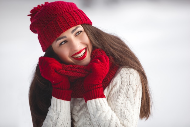 Happy woman in winter landscape