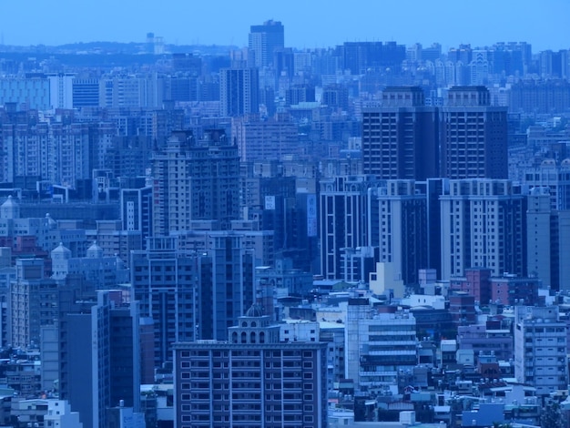 Photo high angle view of buildings in city against sky