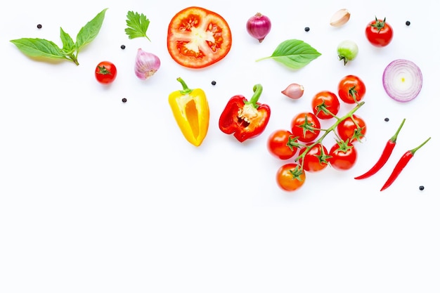 High angle view of chopped fruits on white background