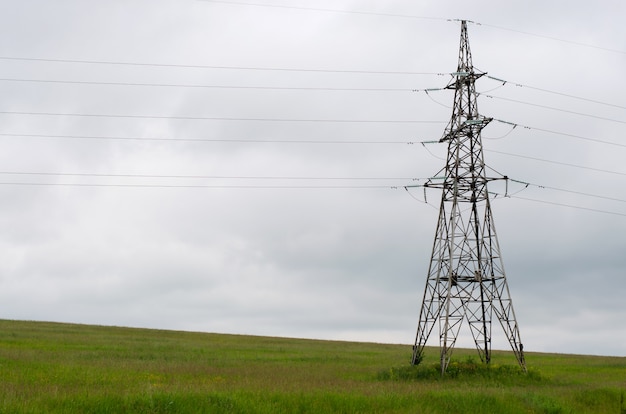 Photo the high voltage electricity pylon. 