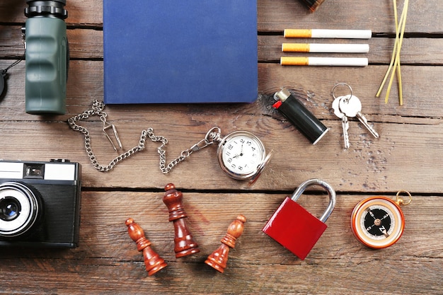 Hiking gear on wooden background