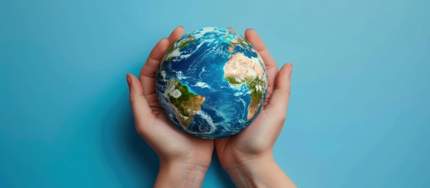 Photo holding the earth a symbol of care and responsibility