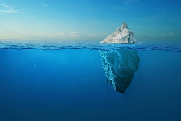 Iceberg With Above And Underwater View Taken In Greenland. Iceberg - Hidden Danger And Global Warming Concept. Iceberg illusion creative idea