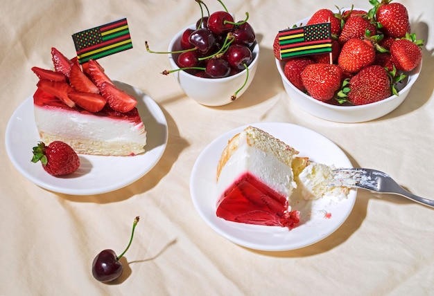 Photo juneteenth day picnic background with cherries and strawberries strawberry cheesecake