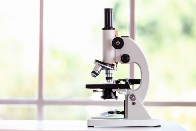 Photo laboratory equipment, microscope science green nature background