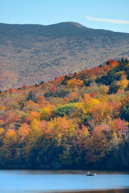 Lake with Autumn foliage and mountains in New England Stowe