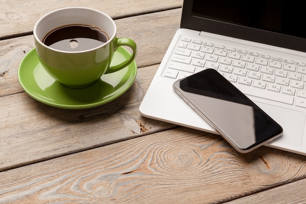 Laptop Coffee Cup Office Concept close up