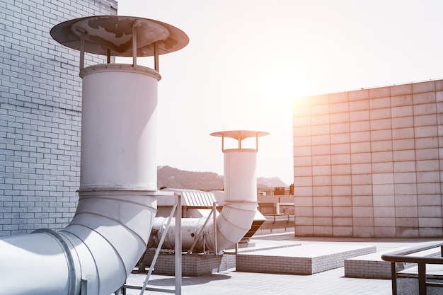 large ventilation system pipeline on building roof