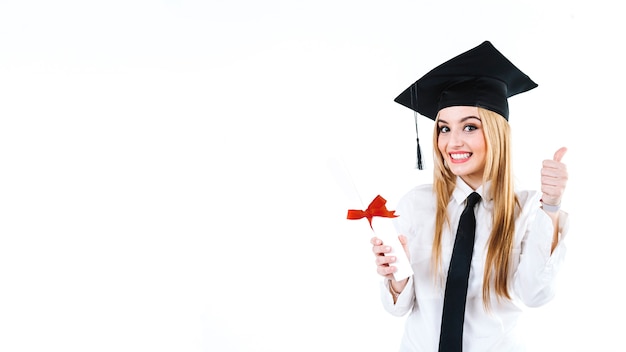 Laughing graduate having diploma and gesturing