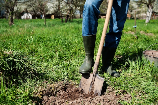 Man digs a hole