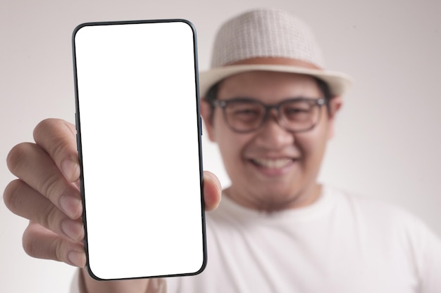 Photo man presenting smart phone mock up