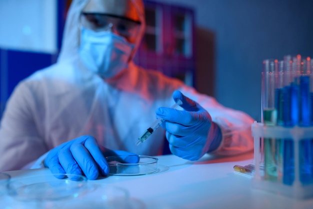 Midsection of scientist working at clinic