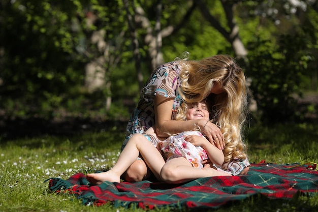 Mother and daughter in the garden