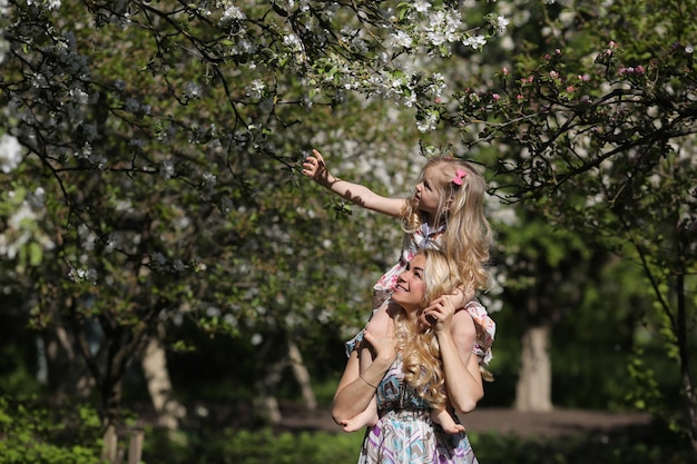 Mother and daughter in the garden