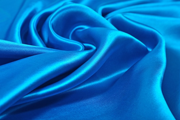 Natural blue satin fabric as background texture