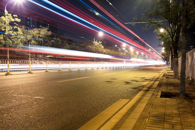 Night traffic on street car lights in motion