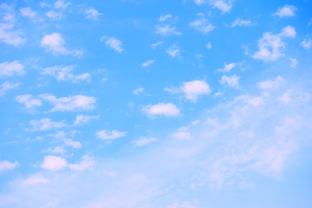 Photo pastel blue sky with white clouds -  natural background with space for your own text