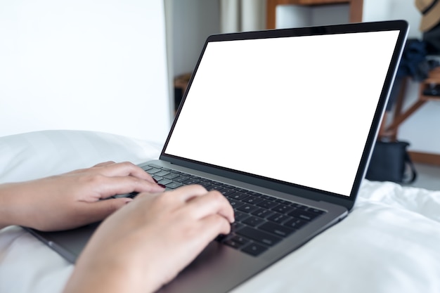 People hand using mockup laptop computer