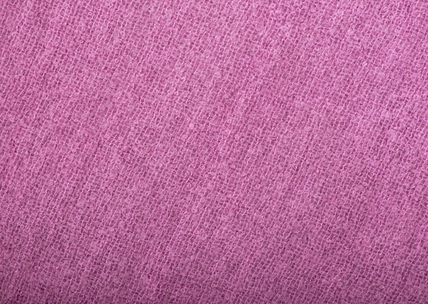 Pink knitted fabric texture used as background