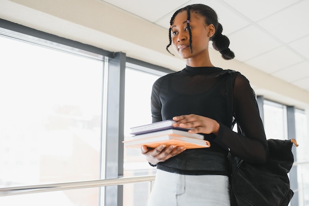 Photo portrait of happy female african american college student