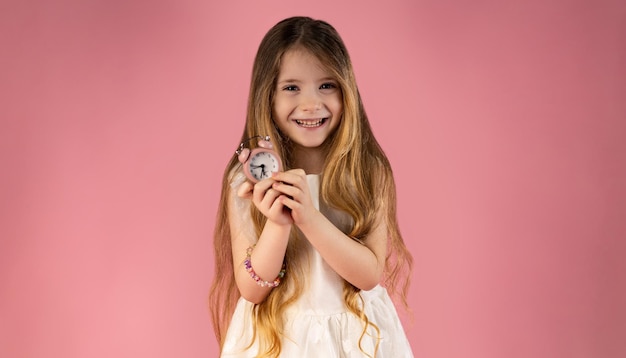 Photo portrait of a very beautiful and special little girl with very arranged and attractive hair she is