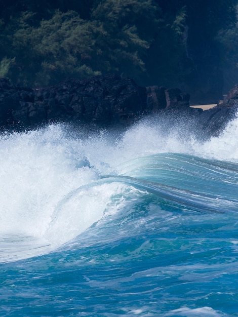 Powerful waves break at Lumahai Beach Kauai