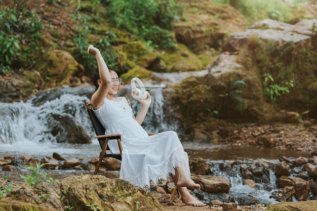 Pregnant woman listening to music