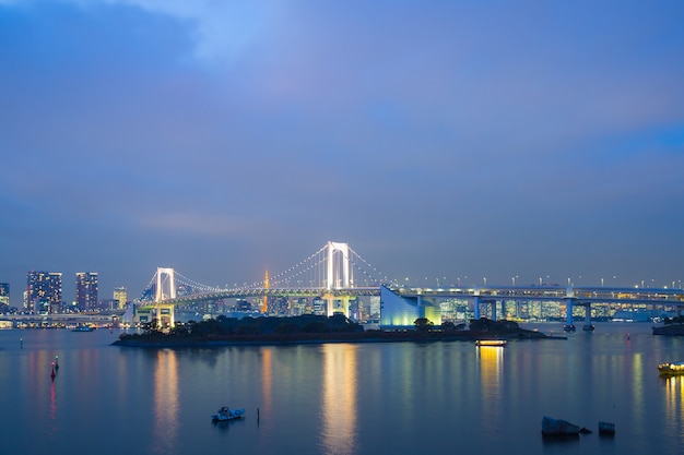 Rainbow bridge in evening at odaiba in Japan.