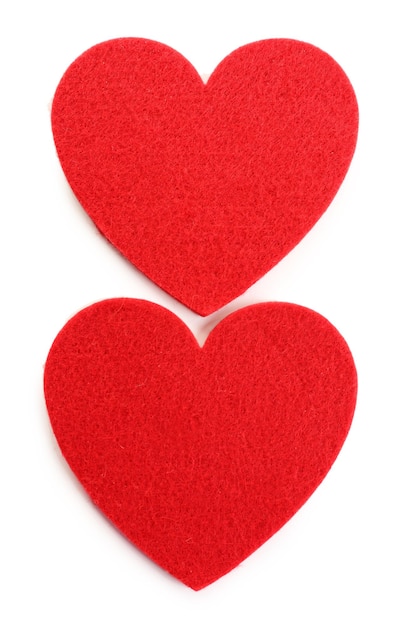 Red felt hearts isolated on white background