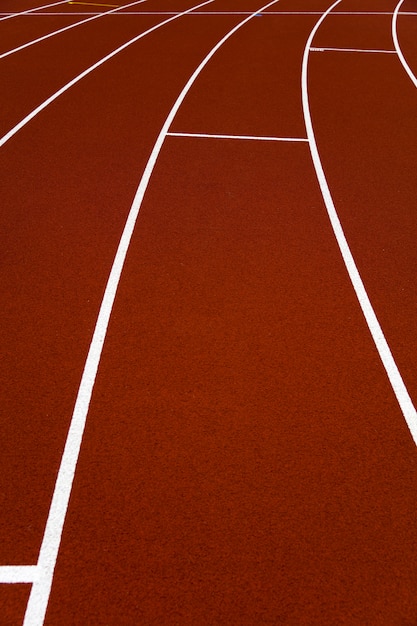 Red stadium running tracks closeup