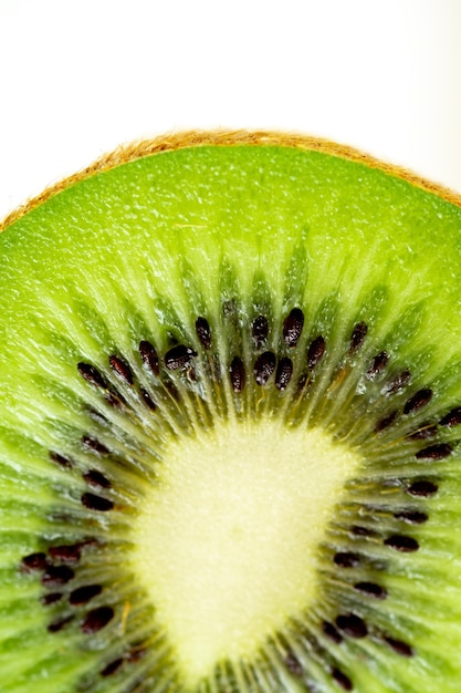 Ripe kiwi isolated on white background.Kiwi macro shot on an isolated background.Kiwi sliced.Macro