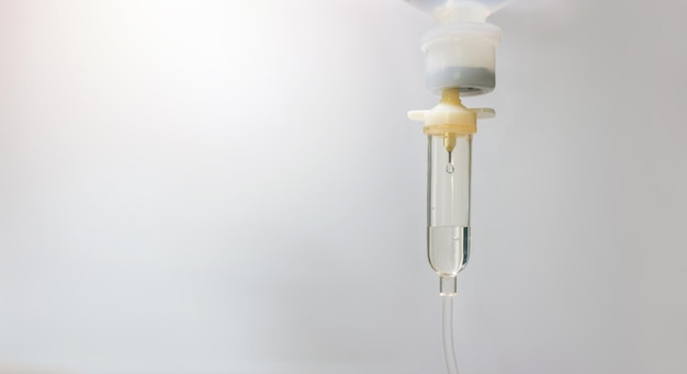 Photo saline drip in the hospital 09 normal saline solution nss set vitamin iv fluid intravenous drop because it is influenza a concept about of treatment emergency medical chemotherapy sick