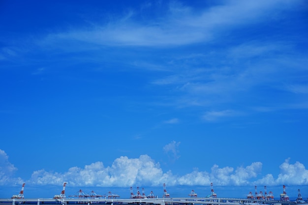 Photo scenic view of calm sea against blue sky