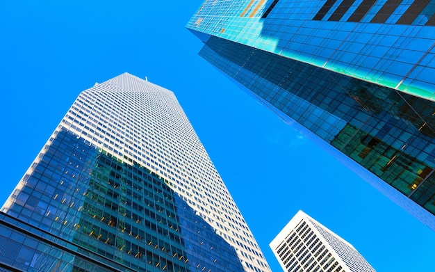 Skyline with Skyscrapers in Financial Center at Lower Manhattan, New York City, America. USA. American architecture building. Panorama of Metropolis NYC. Metropolitan Cityscape