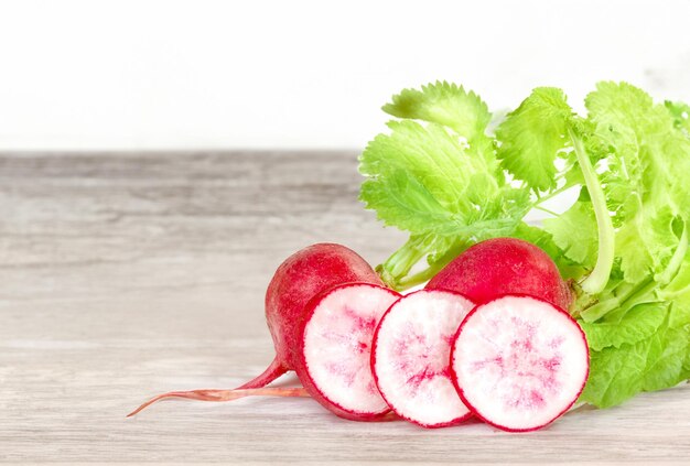 Photo small red radish isolated on white background crisp and tangy